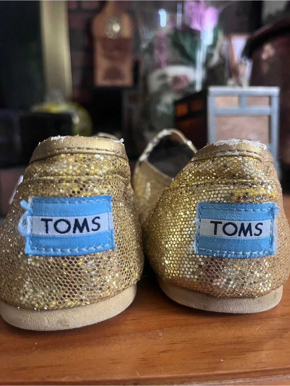 Gold glitter TOMS 7.5